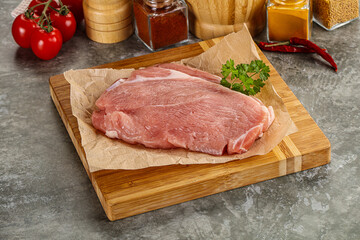 Raw pork schnitzel for cooking