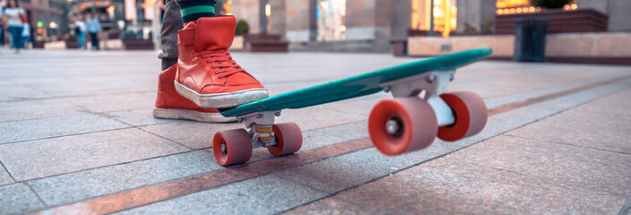 Close up of legs of boy skateboarding, sports concept, stock photo
