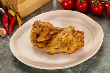 Roasted chicken leg with spices