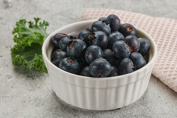 Sweet ripe blueberry on the bowl