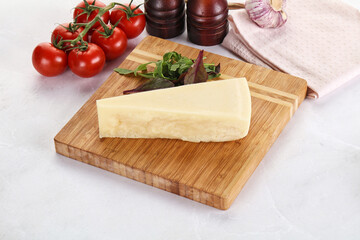 Piece Italian hard parmesan cheese