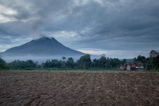 Farmers hut and farmlands of rural  North Sumatra around Sinabung volcano
