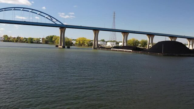 Aerial view of Green Bay Wisconsin Tower Drive Leo Frigo arched bridge; drone reveals two lighthouses