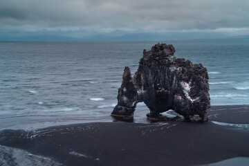 Hvitserkur basalt  rock stack along the eastern shore of the Vatnsnes peninsula, in northwest...