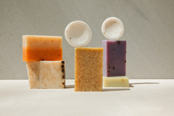 Handmade soap from natural ingredients, various herbs. Concept of sustainable use, bath products. Front view