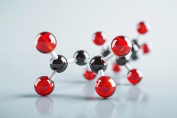 A group of red and black spheres on a clean white background. Ideal for design projects and abstract concepts