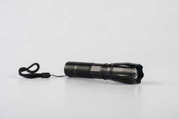 Electric LED torch flashlight isolated on a white background