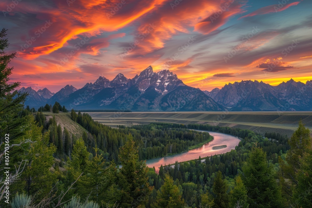 Poster a beautiful mountain range with a river running through it. the sky is filled with clouds and the su