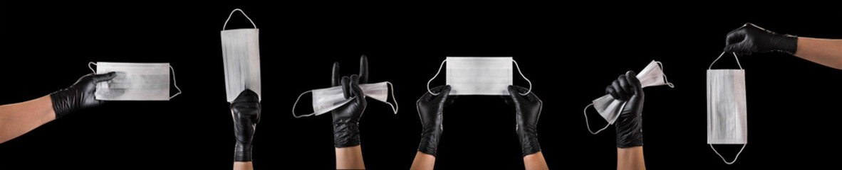 Hand in black gloves wearing disposable face mask isolated on black background