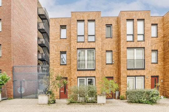 Modern Brick Townhouses with Symmetrical Design