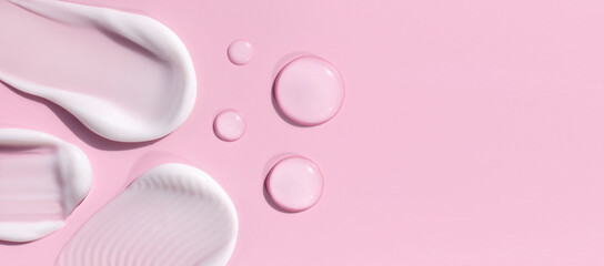 composition of smears of cream texture on a pink background