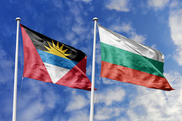  3d illustration. Antigua and Barbuda and Bulgaria Flag waving in sky. High detailed waving flag. 3D render. Waving in sky. Flags fluttered in the cloudy sky.