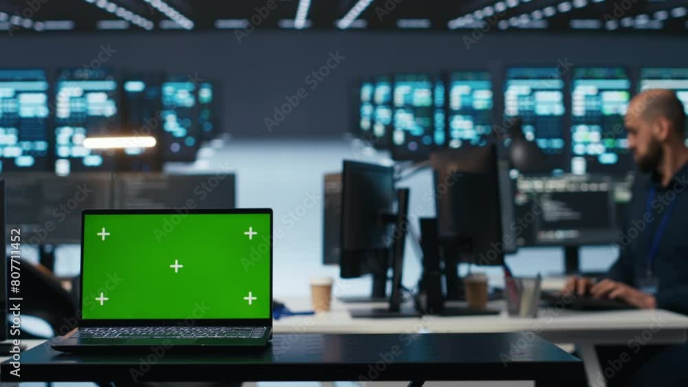 Poster focus on isolated screen laptop device in data center used by admin to safeguard data from virus thr