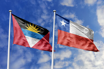  3d illustration. Antigua and Barbuda and Chile Flag waving in sky. High detailed waving flag. 3D render. Waving in sky. Flags fluttered in the cloudy sky.