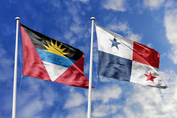 3d illustration. Antigua and Barbuda and Panama Flag waving in sky. High detailed waving flag. 3D render. Waving in sky. Flags fluttered in the cloudy sky.