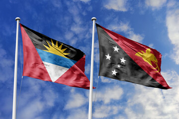3d illustration. Antigua and Barbuda and  Papua New Guinea Flag waving in sky. High detailed waving flag. 3D render. Waving in sky. Flags fluttered in the cloudy sky.
