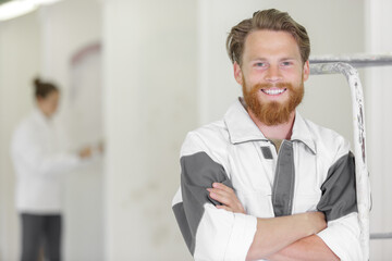 Fototapeta premium happy male decorator looking at camera
