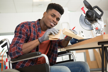 disabled man working with circular saw