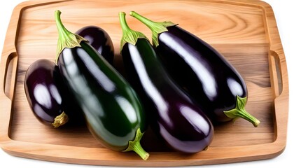 Ripe eggplant on a wooden tray