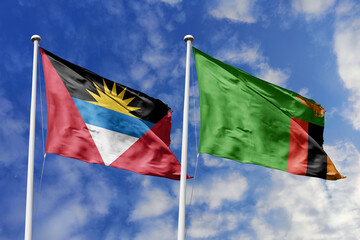 3d illustration. Antigua and Barbuda and Zambia Flag waving in sky. High detailed waving flag. 3D render. Waving in sky. Flags fluttered in the cloudy sky.