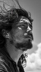 Whispers of strength: The wind tousles his hair as he gazes into the distance, undeterred by challenges ahead.