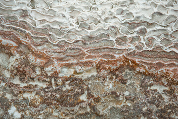 Natural background of porous travertine stone
