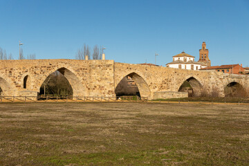 Passo Honroso stone bridge of the village of Hospital de Orbigo in the Way of Santiago. León, Castilla y León, Spain.