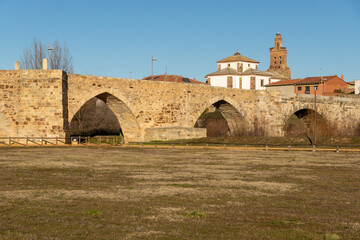 Passo Honroso stone bridge of the village of Hospital de Orbigo in the Way of Santiago. León, Castilla y León, Spain.