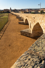 Passo Honroso stone bridge of the village of Hospital de Orbigo in the Way of Santiago. Le&oacute;n, Castilla y Le&oacute;n, Spain.