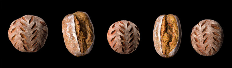 Set of fresh baked bread and French rye baguette isolated on black background