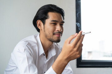 Close up mouth of man smoking tobacco..