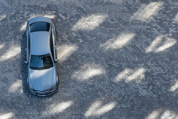 Car top view, auto parked at paved area in city, aerial view of vehicle