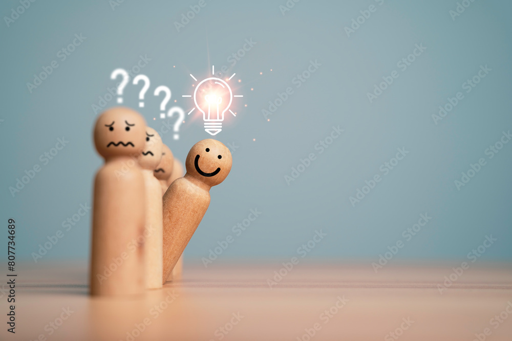 Poster smile wooden miniature figure outstanding from line with glowing lightbulb for creative thinking ide
