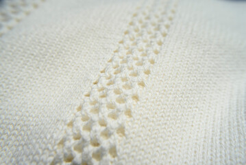 Tira de ganchillo en tejido de lana blanca