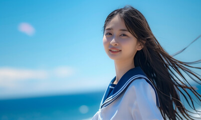 海辺にいるセーラー服の少女