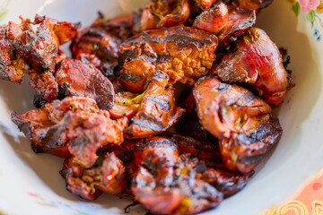close up with chicken livers cooked on the grill.