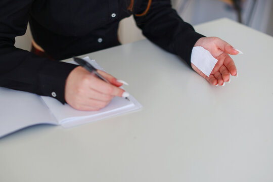 student uses a cheat sheet to pass the exam