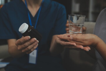 Doctors are giving advice on medication to patients in hospital examination rooms, treating diseases from specialists and providing targeted treatment. Concepts of medical treatment and specialists.