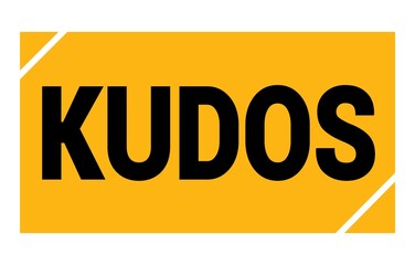 KUDOS text written on yellow-black stamp sign.
