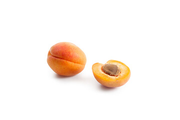 Apricot fruit whole and half isolated on white background..