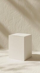White box sitting on a white surface. Vertical background  