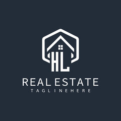 initial monogram logo for real estate with building shape creative design	
