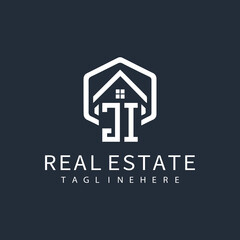 initial monogram logo for real estate with building shape creative design	

