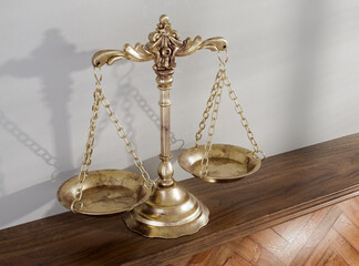 Justice Scale On Wooden  Shelf Surface