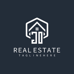 initial monogram logo for real estate with building shape creative design	
