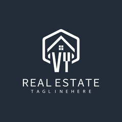 initial monogram logo for real estate with building shape creative design	
