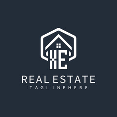 initial monogram logo for real estate with building shape creative design	
