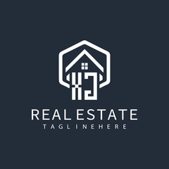 initial monogram logo for real estate with building shape creative design	
