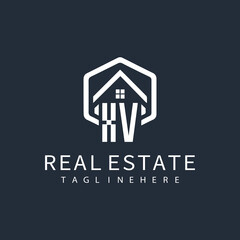 initial monogram logo for real estate with building shape creative design	
