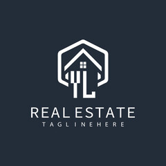initial monogram logo for real estate with building shape creative design	
